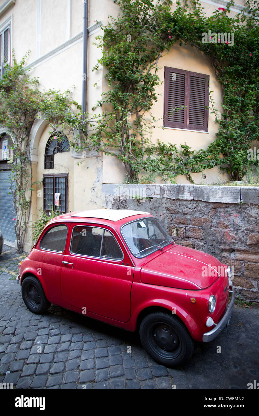 Fiat 500 parked in a back street in central Rome, Italy Stock Photo - Alamy