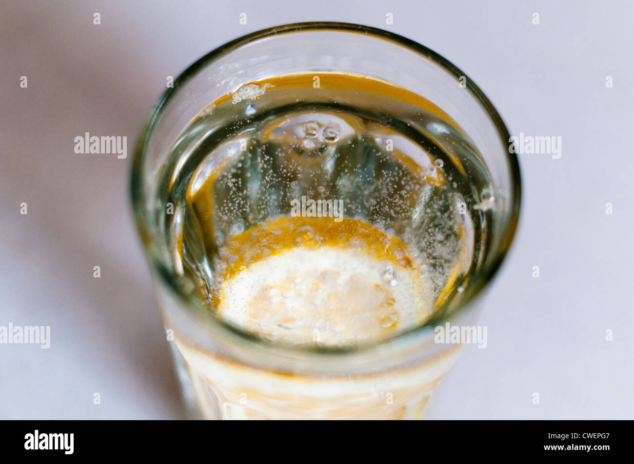 slice of lemon drops in a glass of mineral water Stock Photo