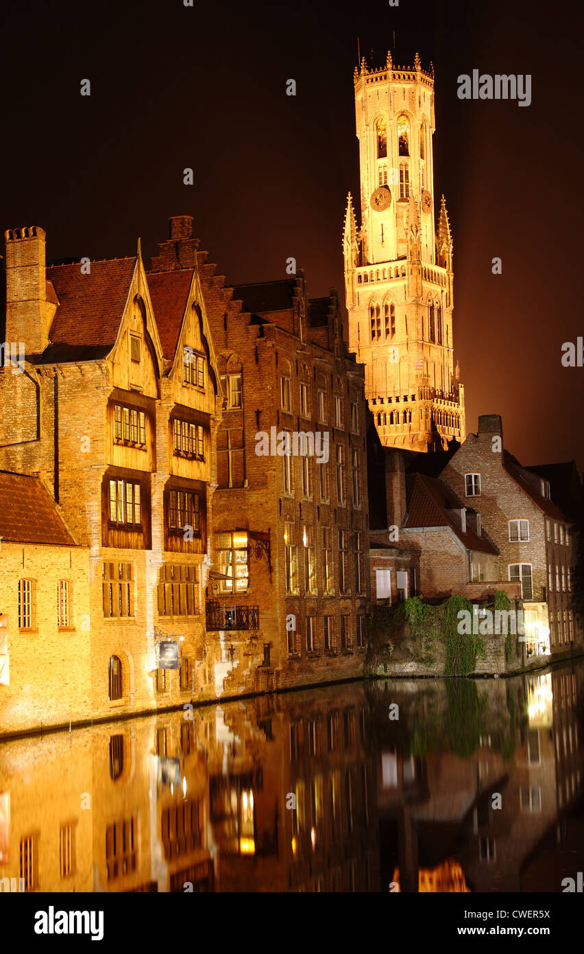 night scene: the Bell Tower and old town of Bruges in Belgium Stock Photo