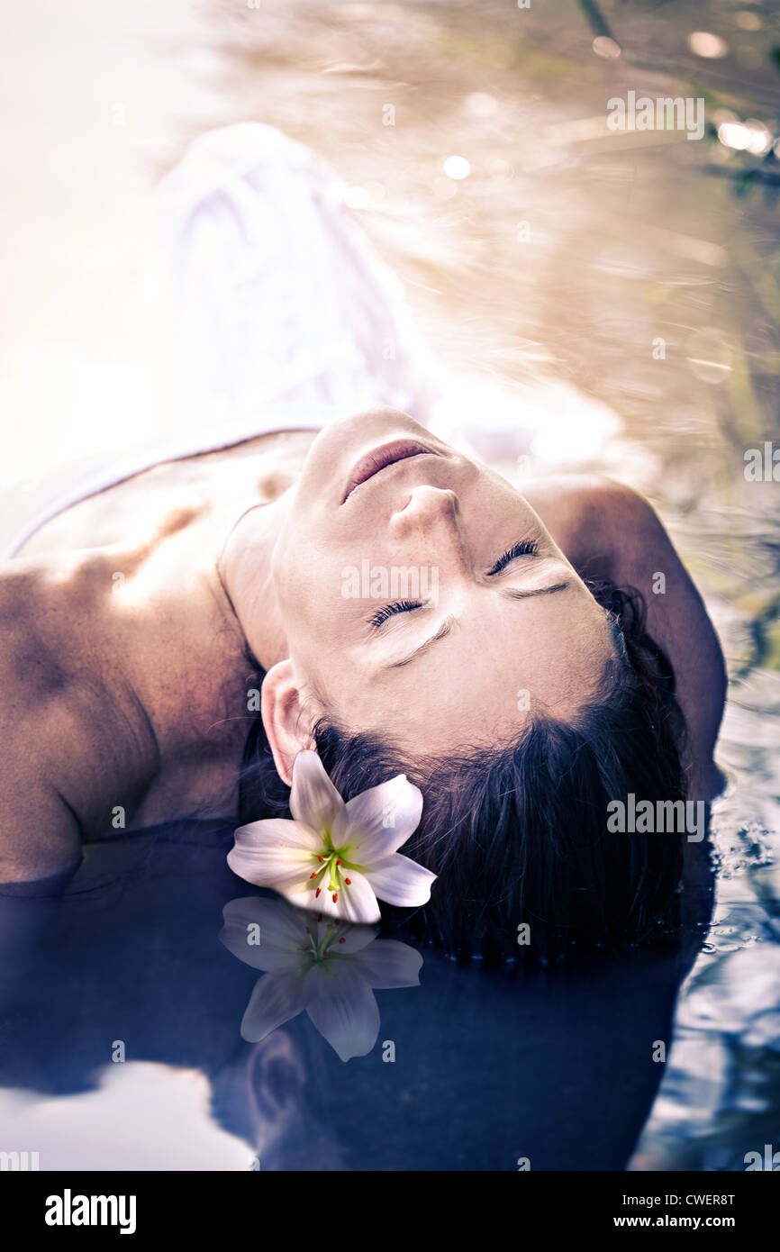an outdoor portrait of a young woman in the water Stock Photo - Alamy