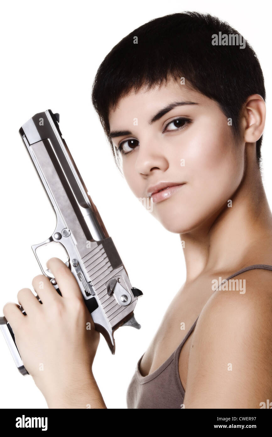 studio shot on white background: young woman holding .44 Magnum Stock Photo