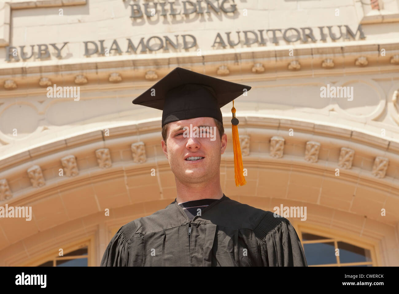 Recent FSU graduate poses in front of the Westcott Building on the Campus of Florida State University in Tallahassee, Florida. Stock Photo
