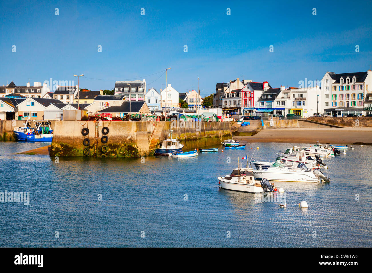 The small French port of Quiberon, Cote Sauvage, viewed from the ferry as it leaves for Belle Ile. Stock Photo