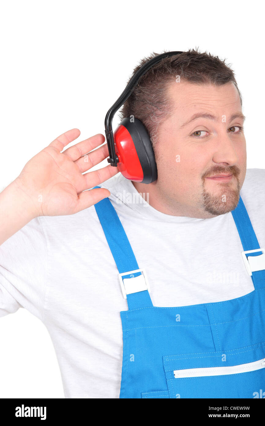 Man wearing ear defenders Stock Photo Alamy
