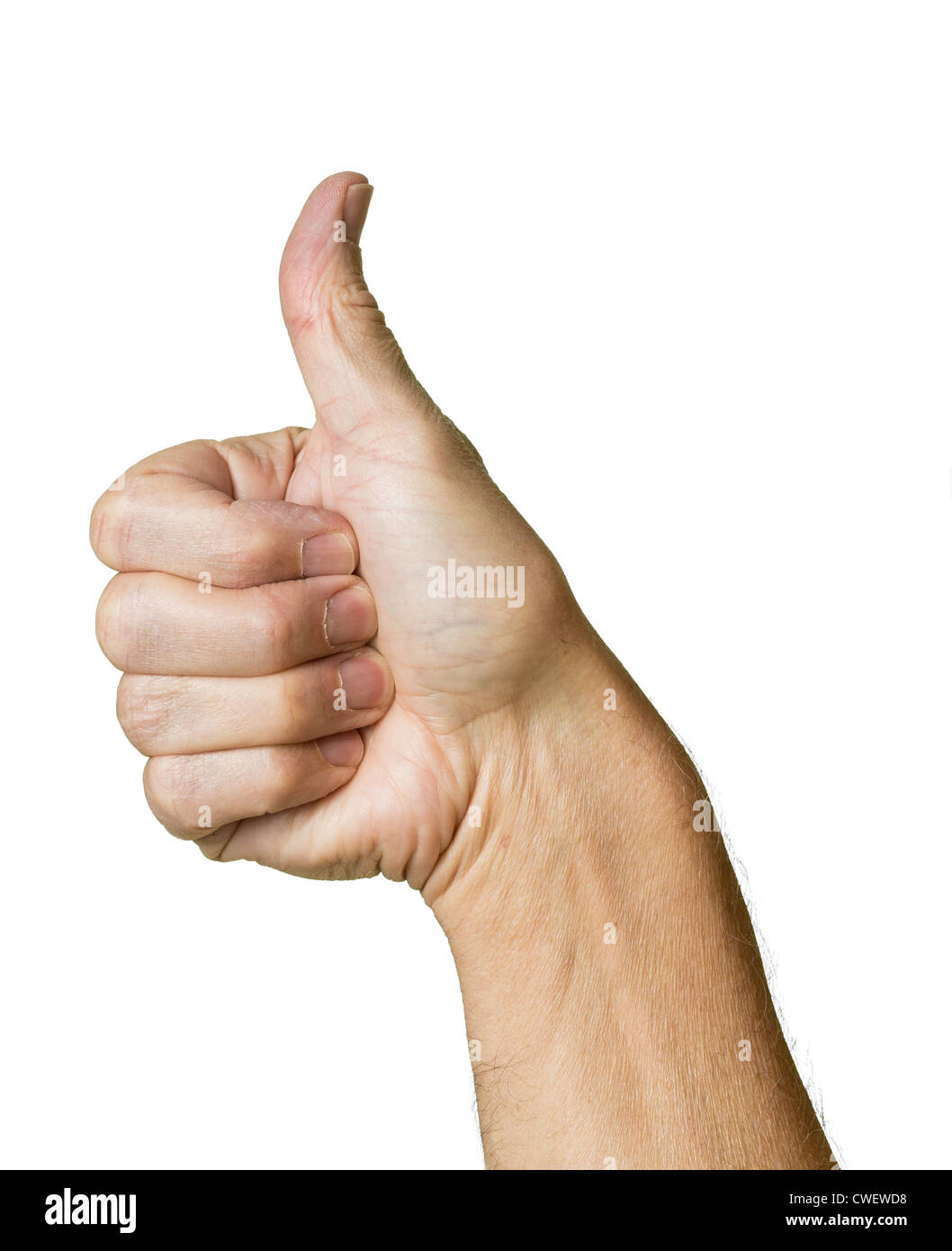 Man making thumbs up gesture in the studio close up Stock Photo