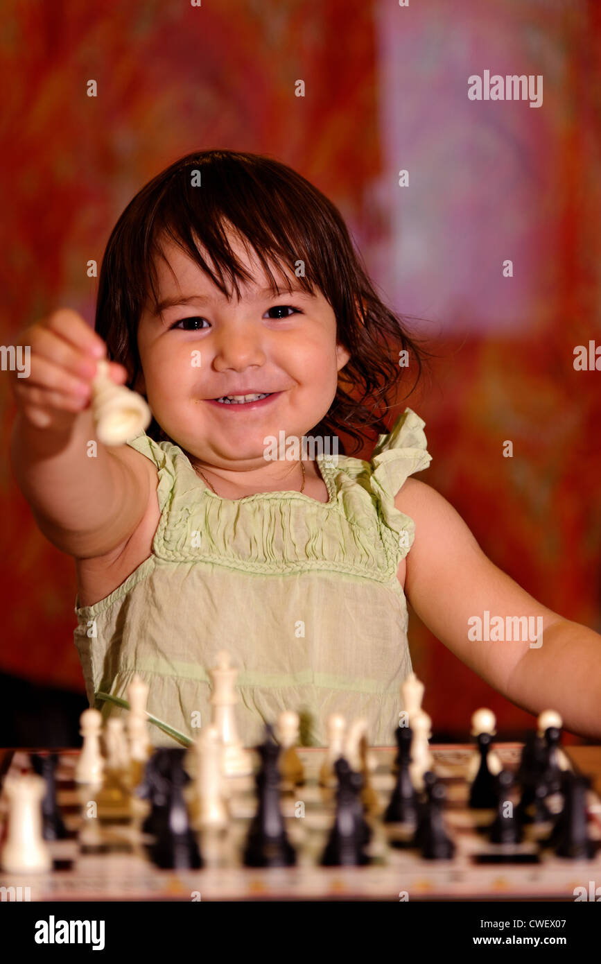 Toddler Girl Playing Chess Stock Photo - Alamy