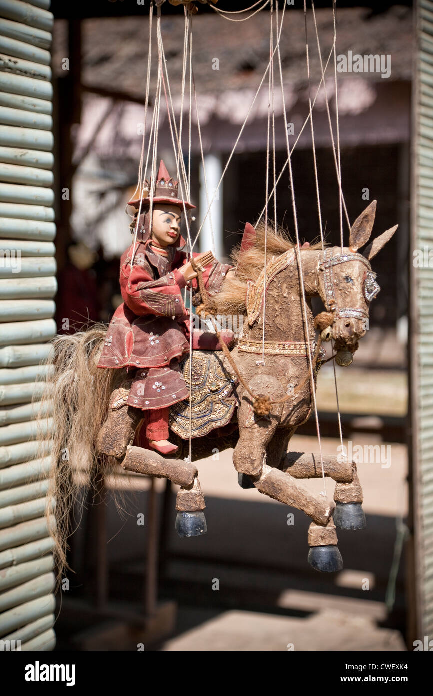 Myanmar, Burma. Mingun, near Mandalay. Marionette Horseback Rider for Sale in a Shop. Stock Photo