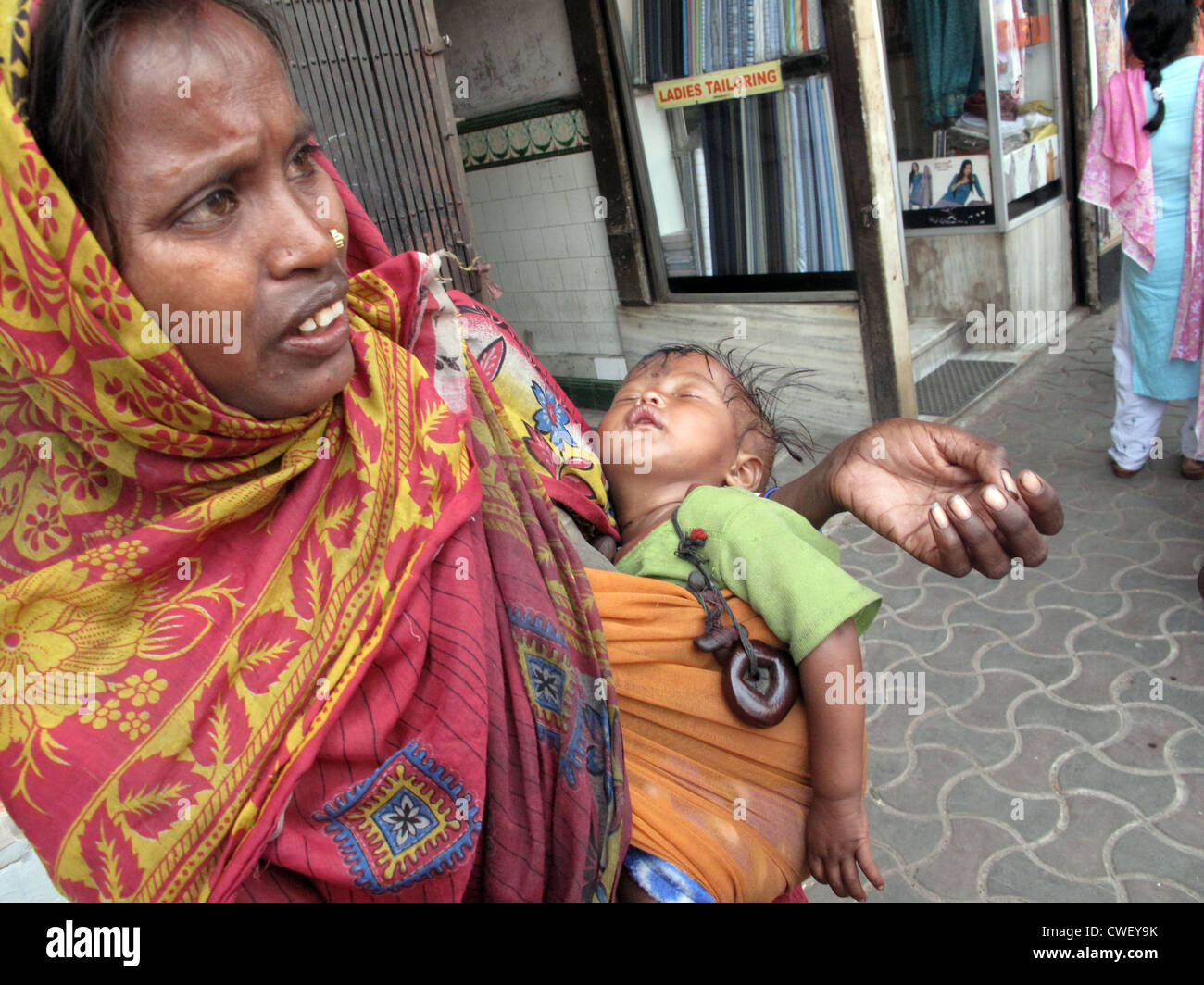 Streets of Kolkata. Thousands of beggars are the most disadvantaged castes living in the streets. Kolkata, India, Jan 28, 2009. Stock Photo