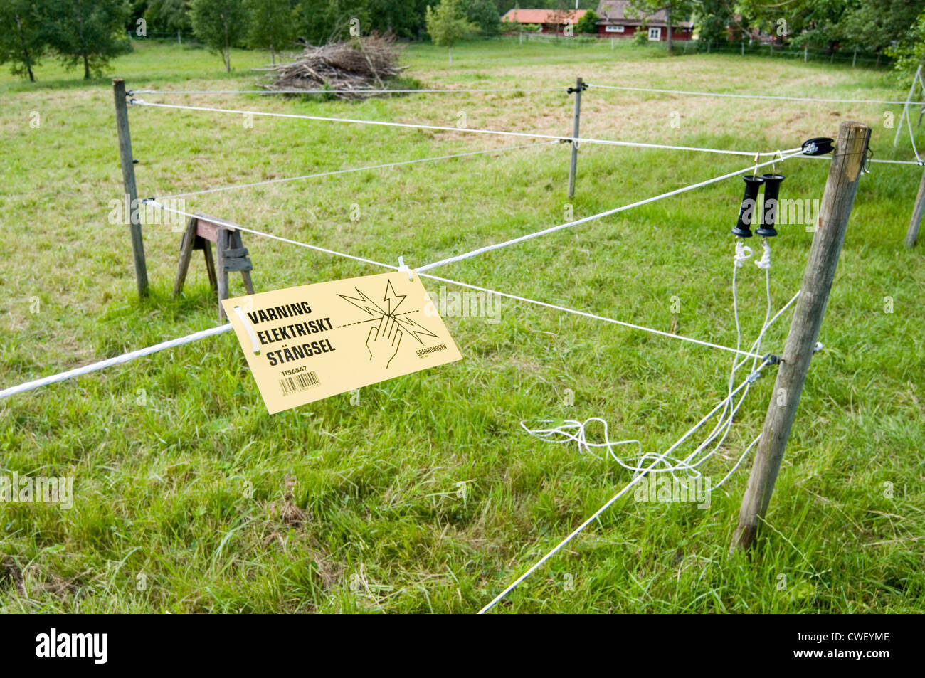 electric fence fences field electrocution electrified electrocuted Stock Photo