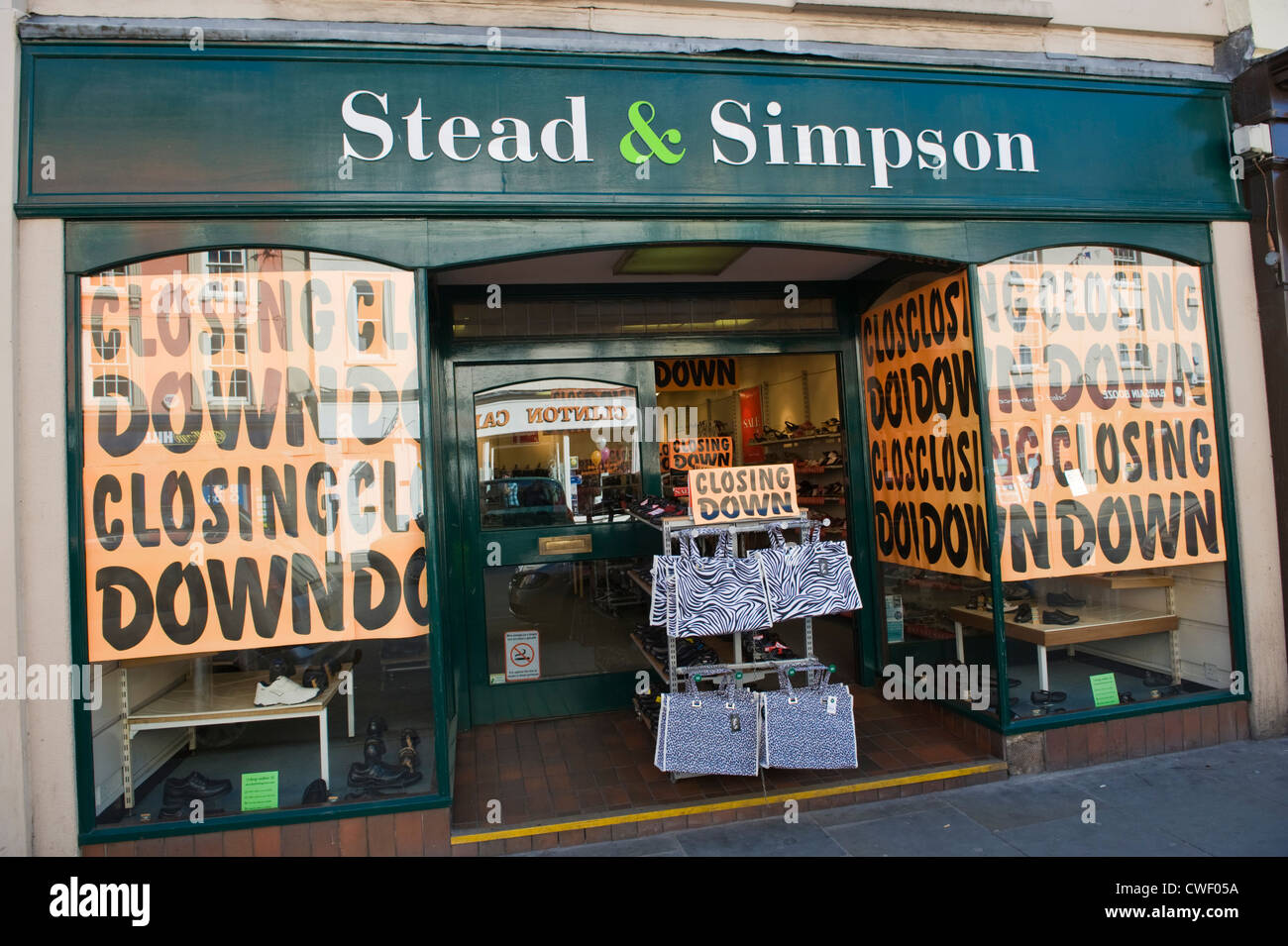 Stead & Simpson shoe shop closing down on high street at Brecon Powys South Wales Cymru UK Stock Photo