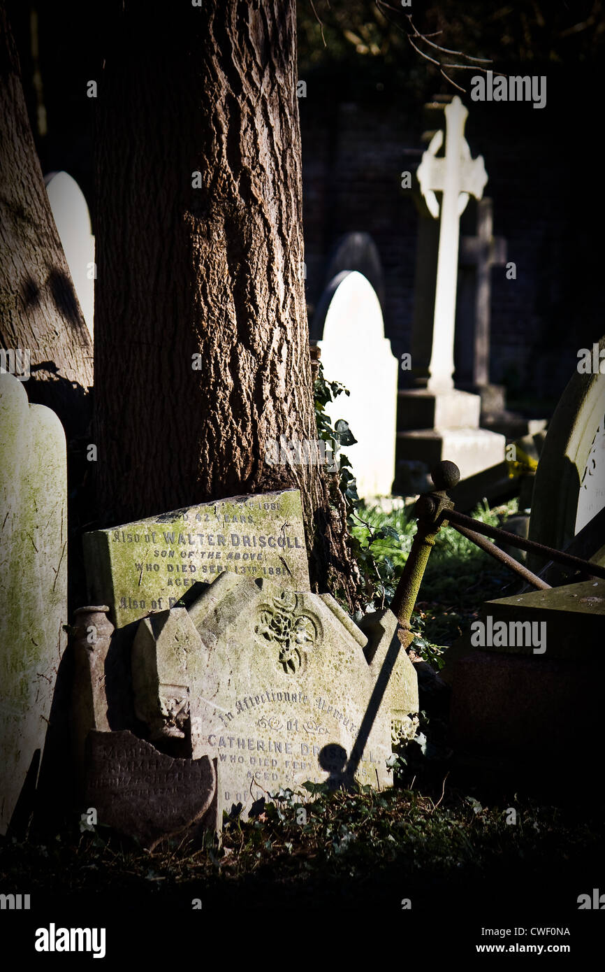 Broken headstones hi-res stock photography and images - Alamy