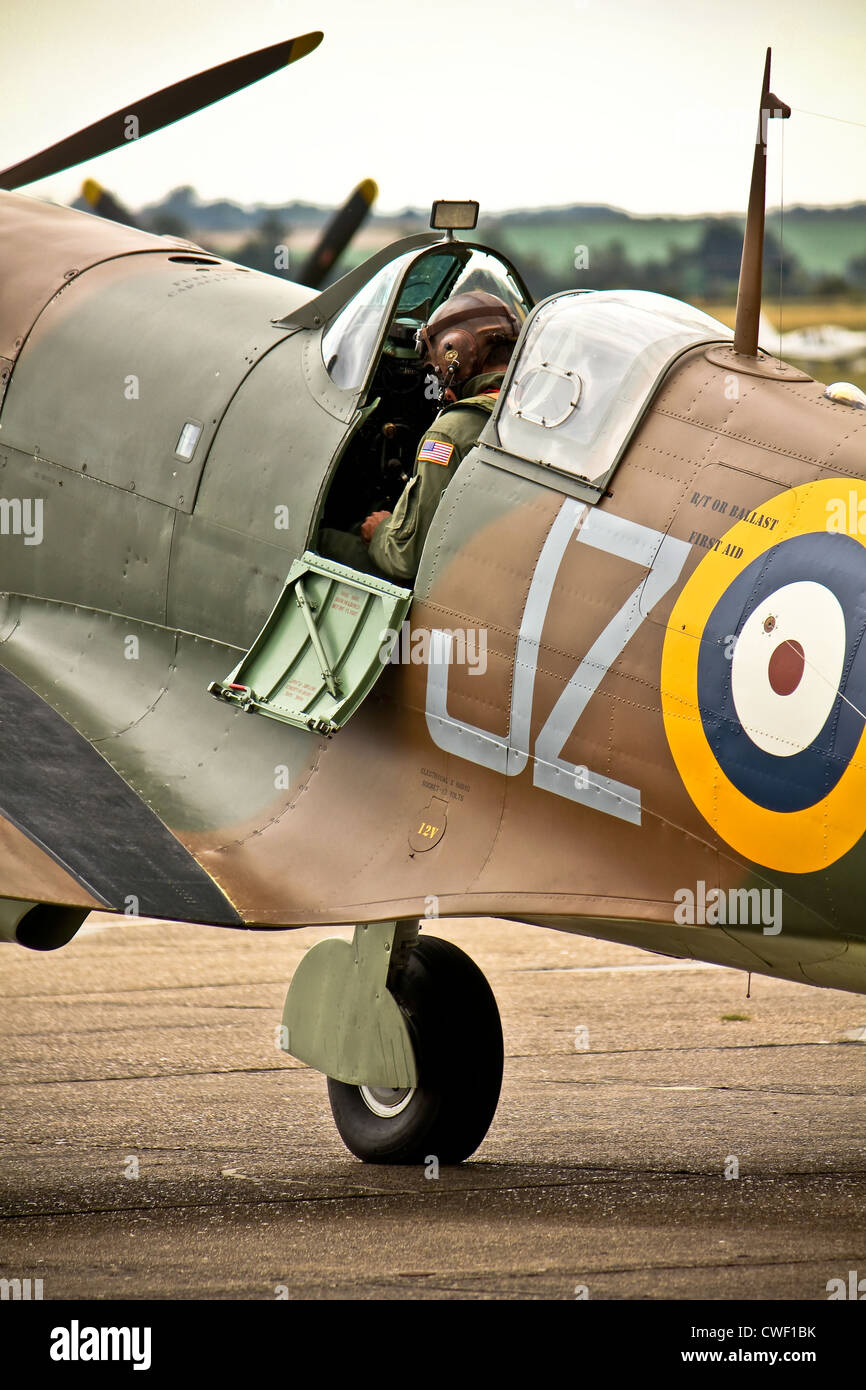 Pilot of spitfire carries out pre flight checks Stock Photo
