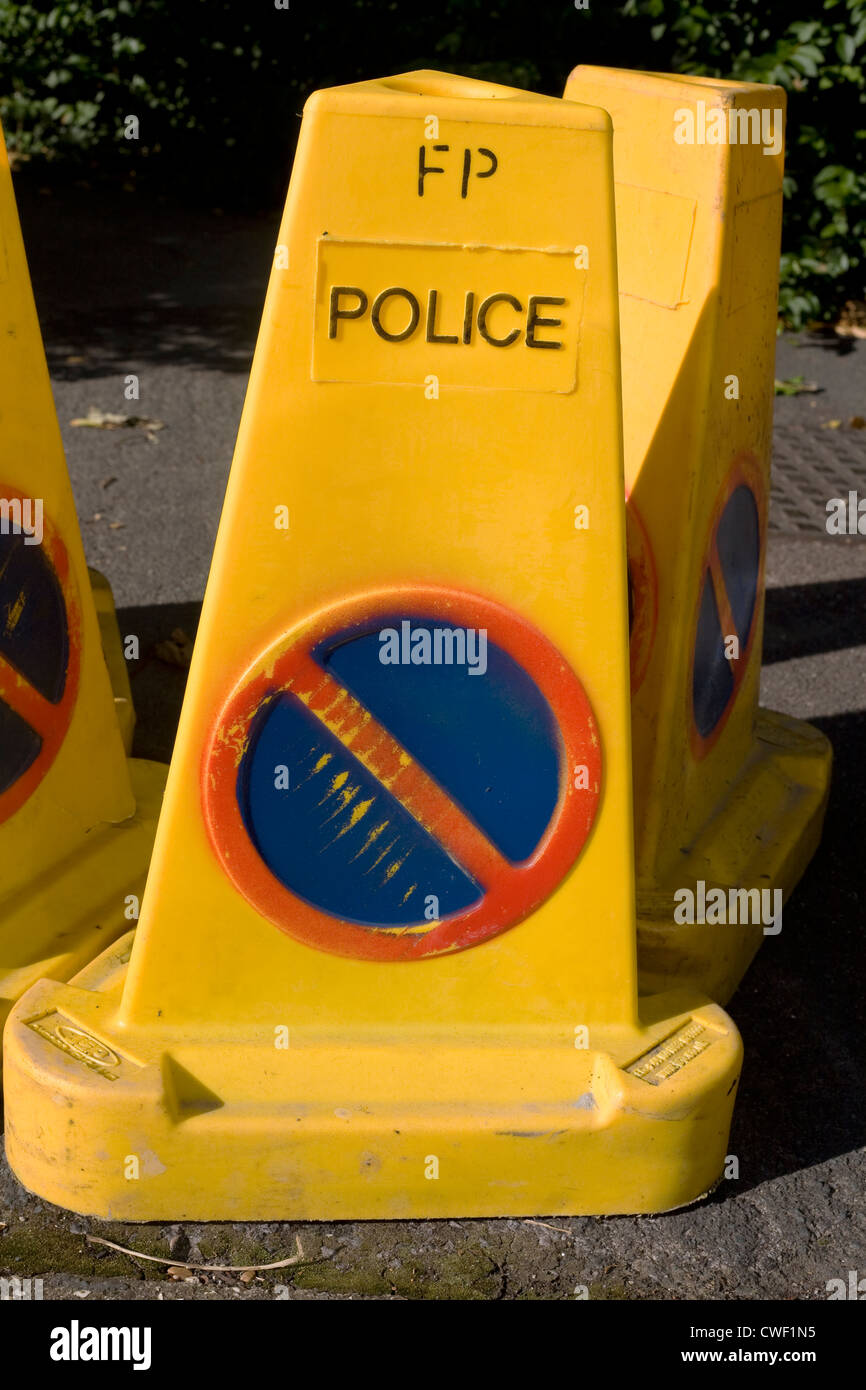 Yellow police no waiting cones in Havant, Hampshire Stock Photo
