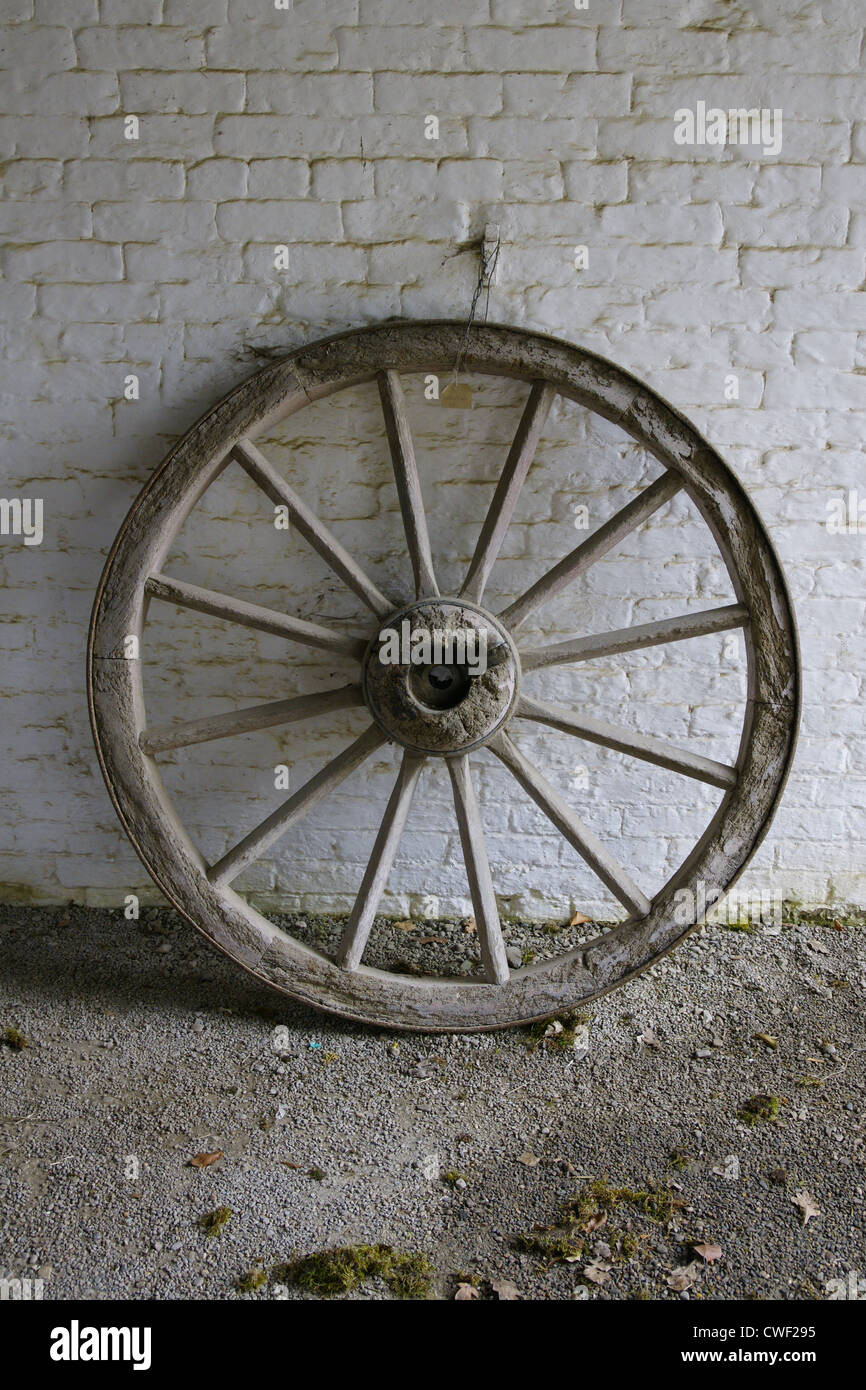 Cartwheel as would have been used on a cart or wagon or coach in days gone by Stock Photo