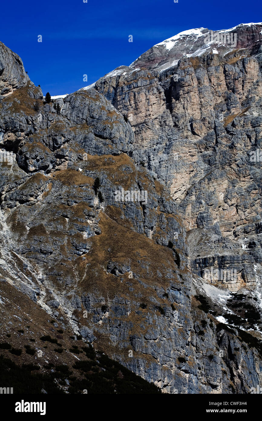 Cliff faces above The Edelweisstal above Colfosco winter  between Selva and Corvara Dolomites Italy Stock Photo