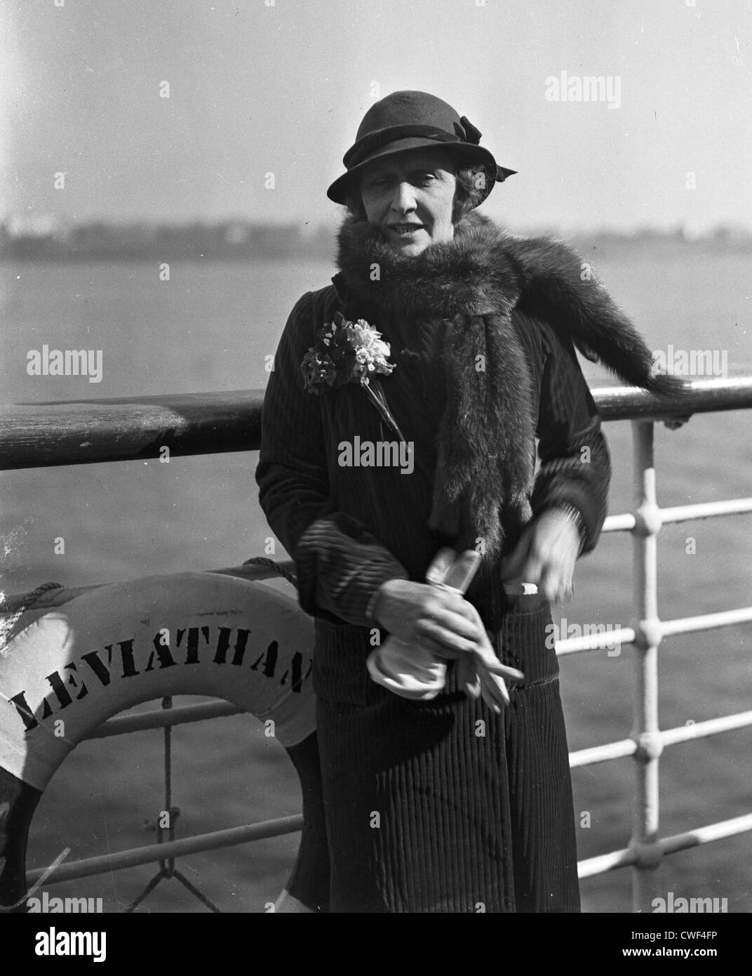 Lady Nancy Astor standing at the railing of the ocean liner Leviathan, ca 1930 Stock Photo