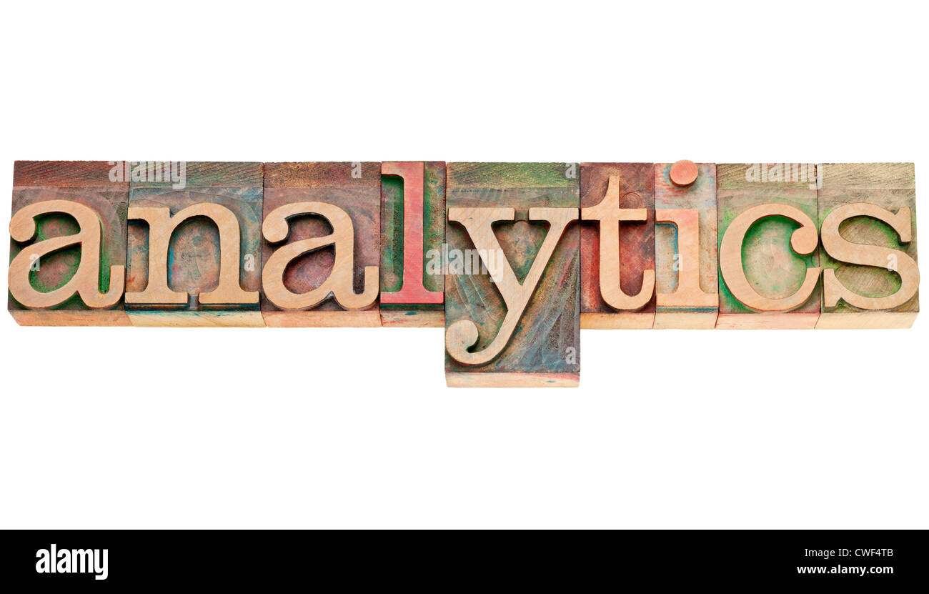 analytics - isolated word in vintage letterpress wood type stained by ...