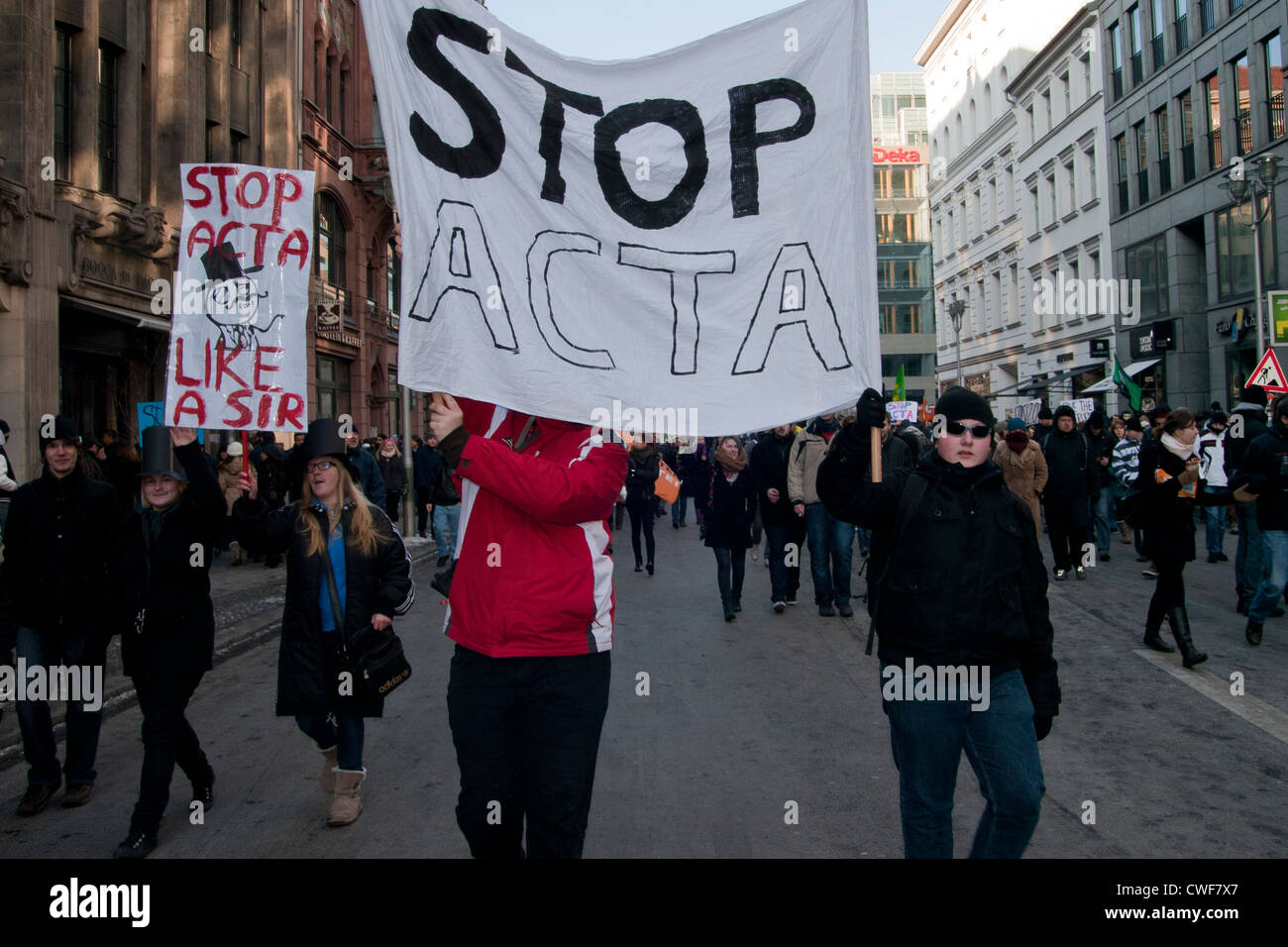 Anti Acta demonstration in Berlin. Protesters hold a banner. Stock Photo
