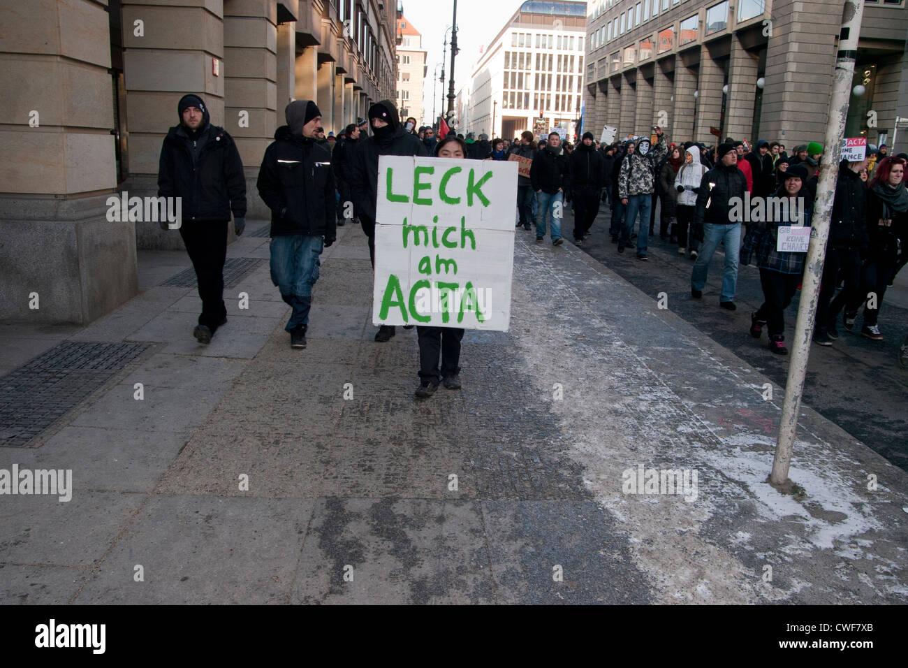 Anti Acta demonstration in Berlin. Man holds a sign. Stock Photo