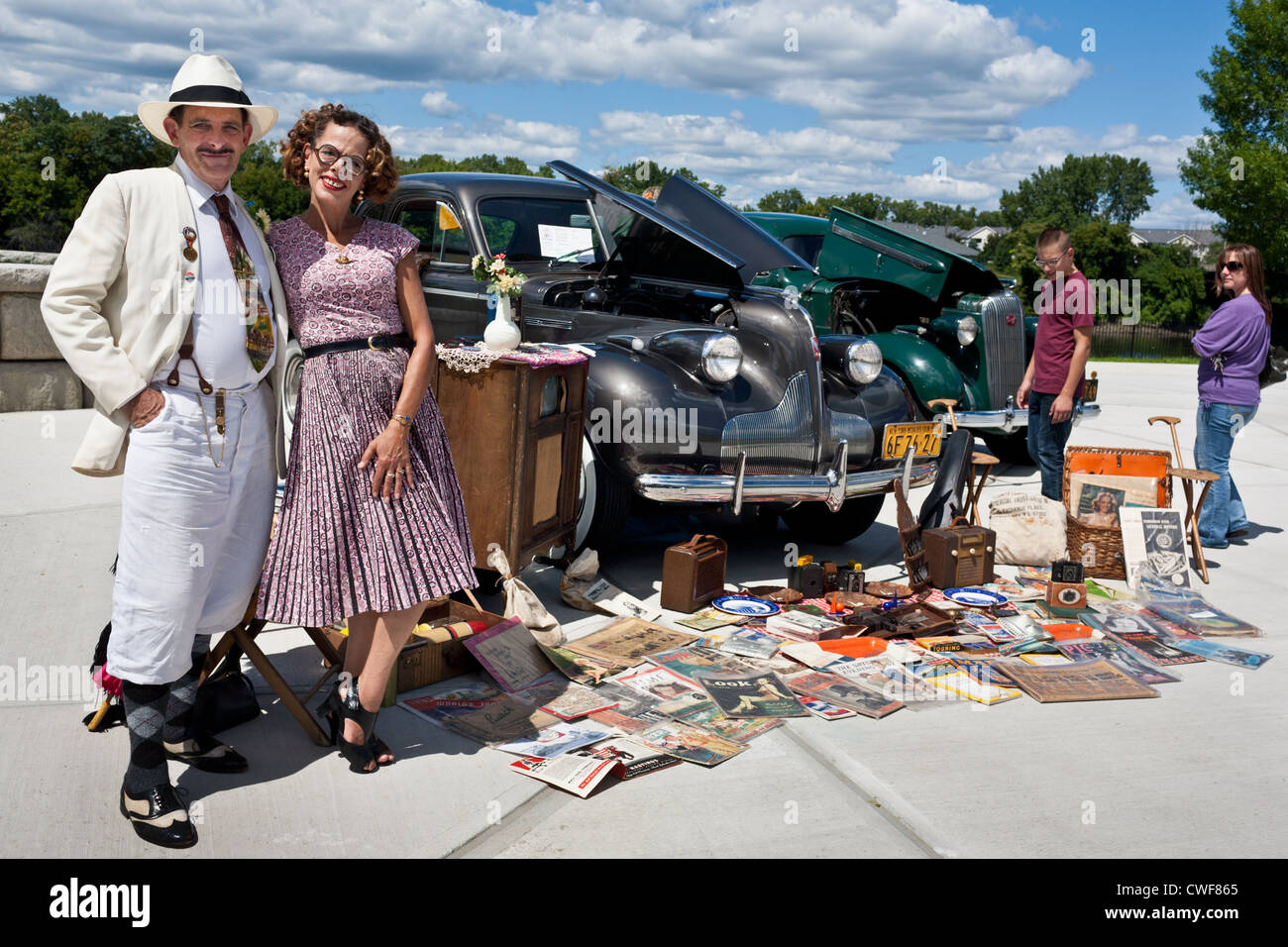 Couple with their 1939 Buick Roadmaster, dressing the part at a Buick car show in Troy, New York State Stock Photo