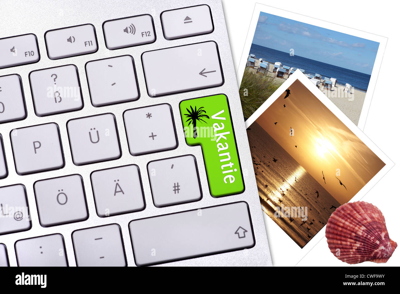 Computer keyboard button with dutch label Vakantie, two photos and a ...