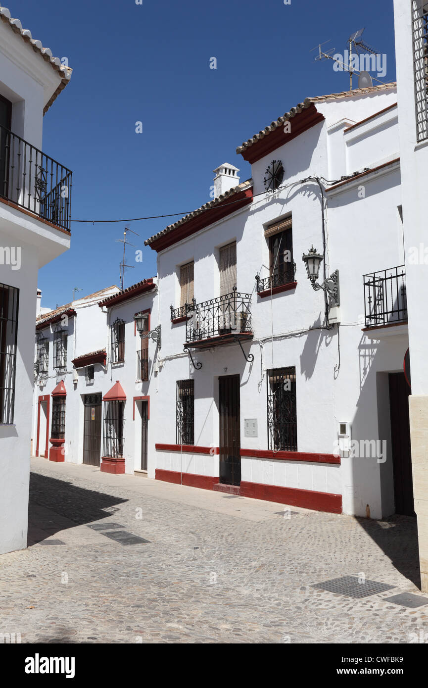 Narrow street in town Ronda, Andalusia Spain Stock Photo