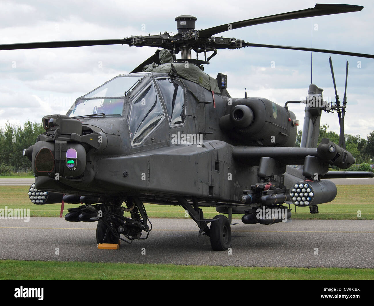 Fully armed Dutch Royal Airforce Apache AH-64 helicopter at Seppe airfield, Noord Brabant, the Netherlands Stock Photo