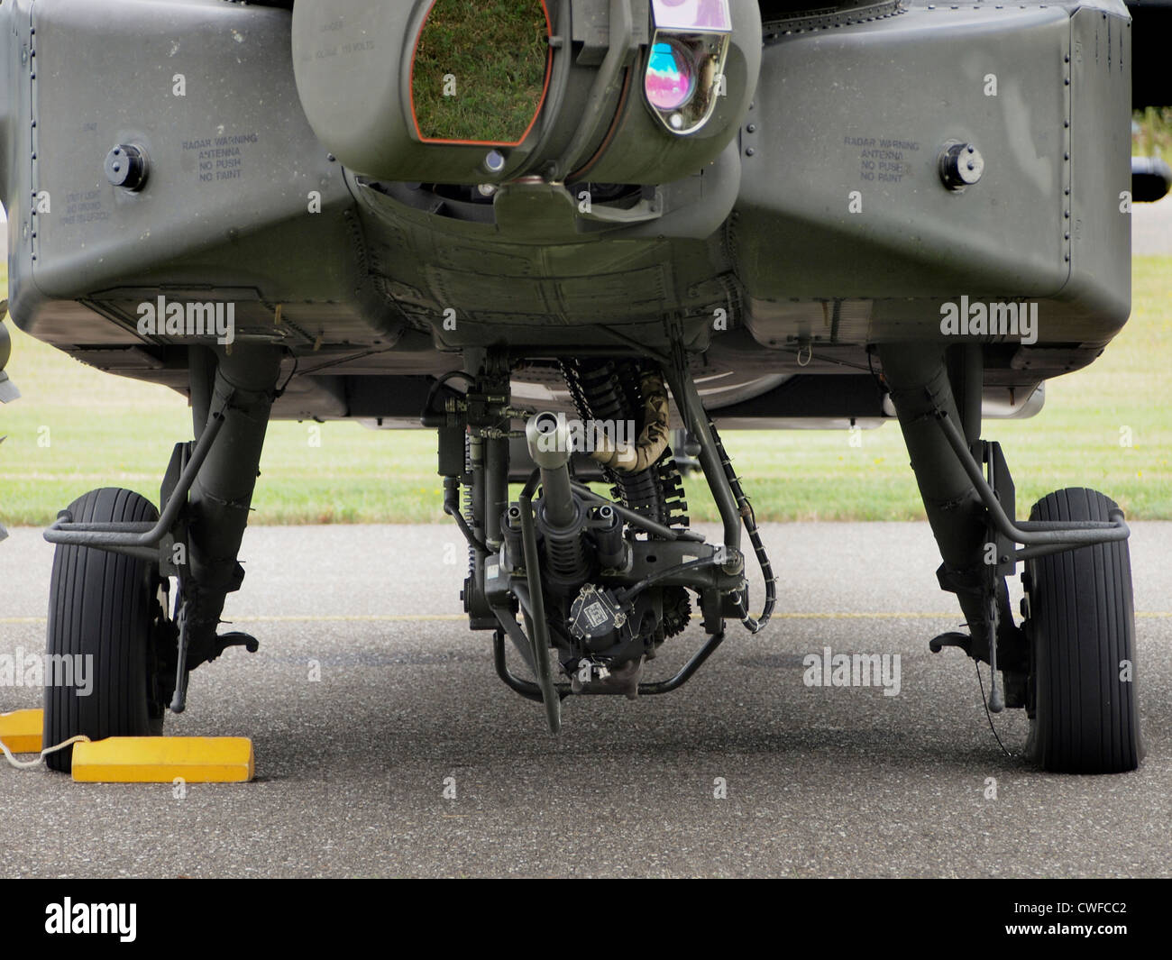 Machine gun on Dutch Royal Airforce Apache AH-64 helicopter at Seppe airfield, Noord Brabant, the Netherlands Stock Photo