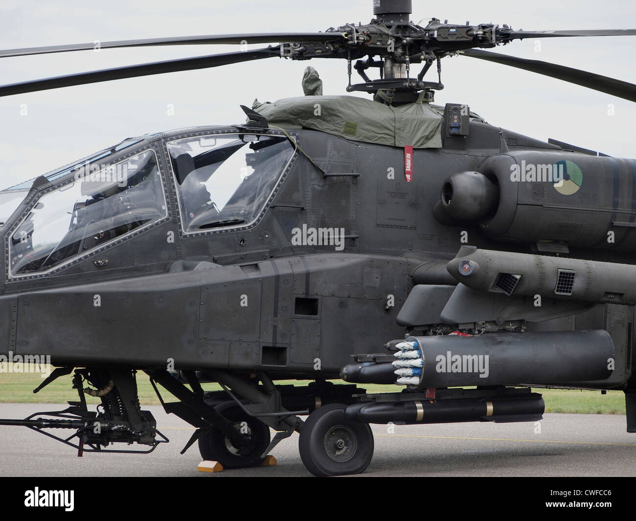 Fully armed Dutch Royal Airforce Apache AH-64 helicopter at Seppe airfield, Noord Brabant, the Netherlands Stock Photo