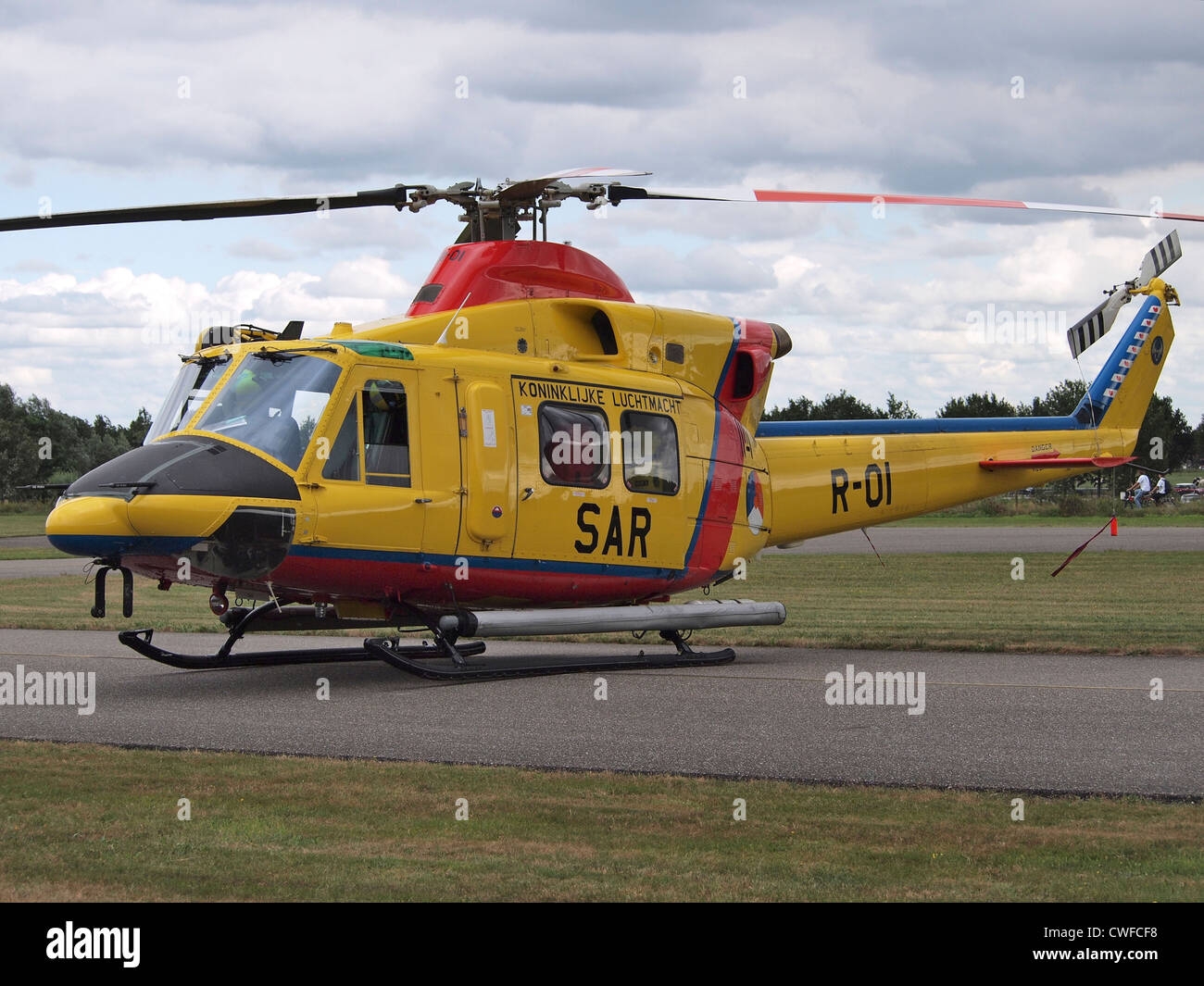 Dutch SAR search and rescue helicopter Agusta Bell 412 SP side view at Seppe airfield, the Netherlands Stock Photo