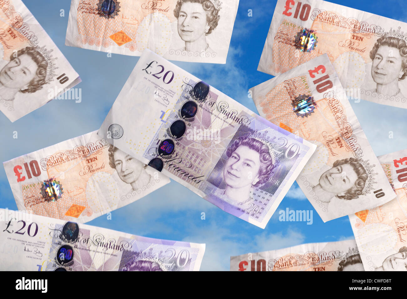 Pound sterling money notes falling from the sky Stock Photo