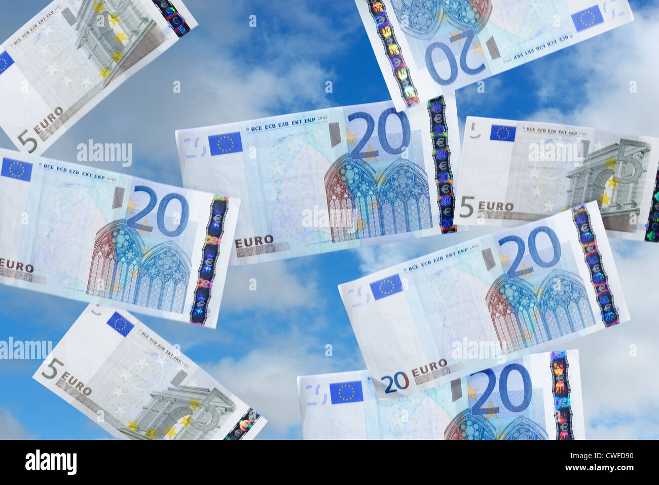 Euro money notes falling from the sky Stock Photo