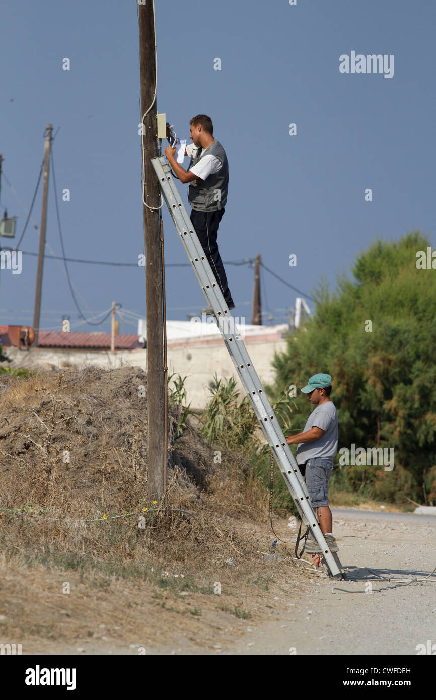 Man footing ladder hires stock photography and images Alamy