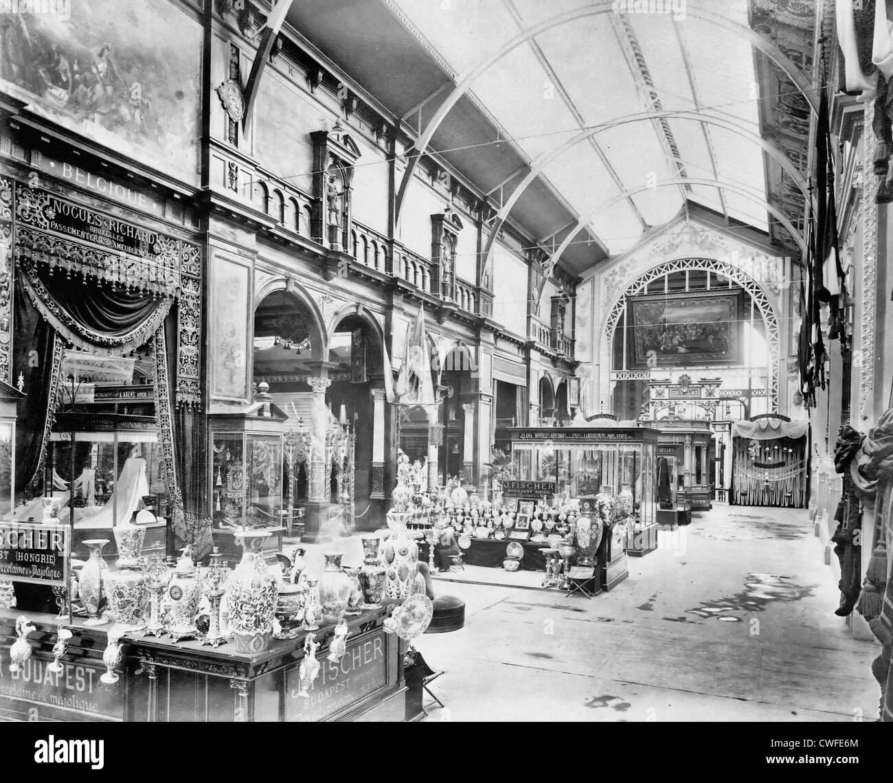 Interior of the Palace of Diverse Industries, showing an exhibit of porcelain and majolica by J. Fischer, Budapest, Hungary, Paris Exposition, 1889 Stock Photo