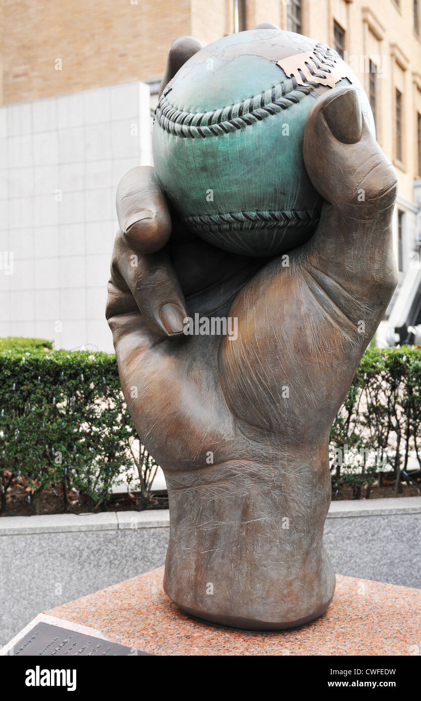 Statue of hand holding baseball ball in Tokyo, Japan Stock Photo Alamy