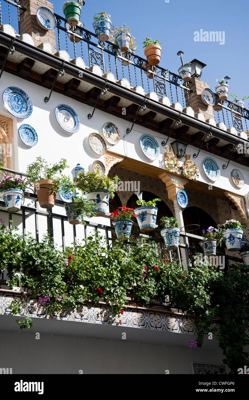 Traditional house in the Albaicin neighbourhood, Granada, decorated with colourful ceramic plates Stock Photo