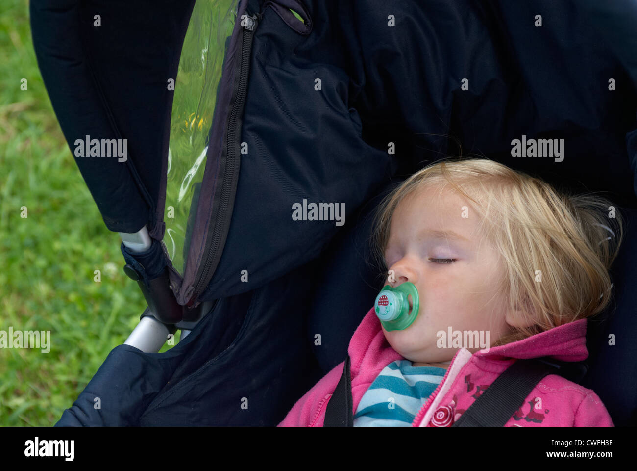 Portrait Of Baby Child Blond Girl 1 Year Old Sleeping Outdoors Stock Photo Alamy