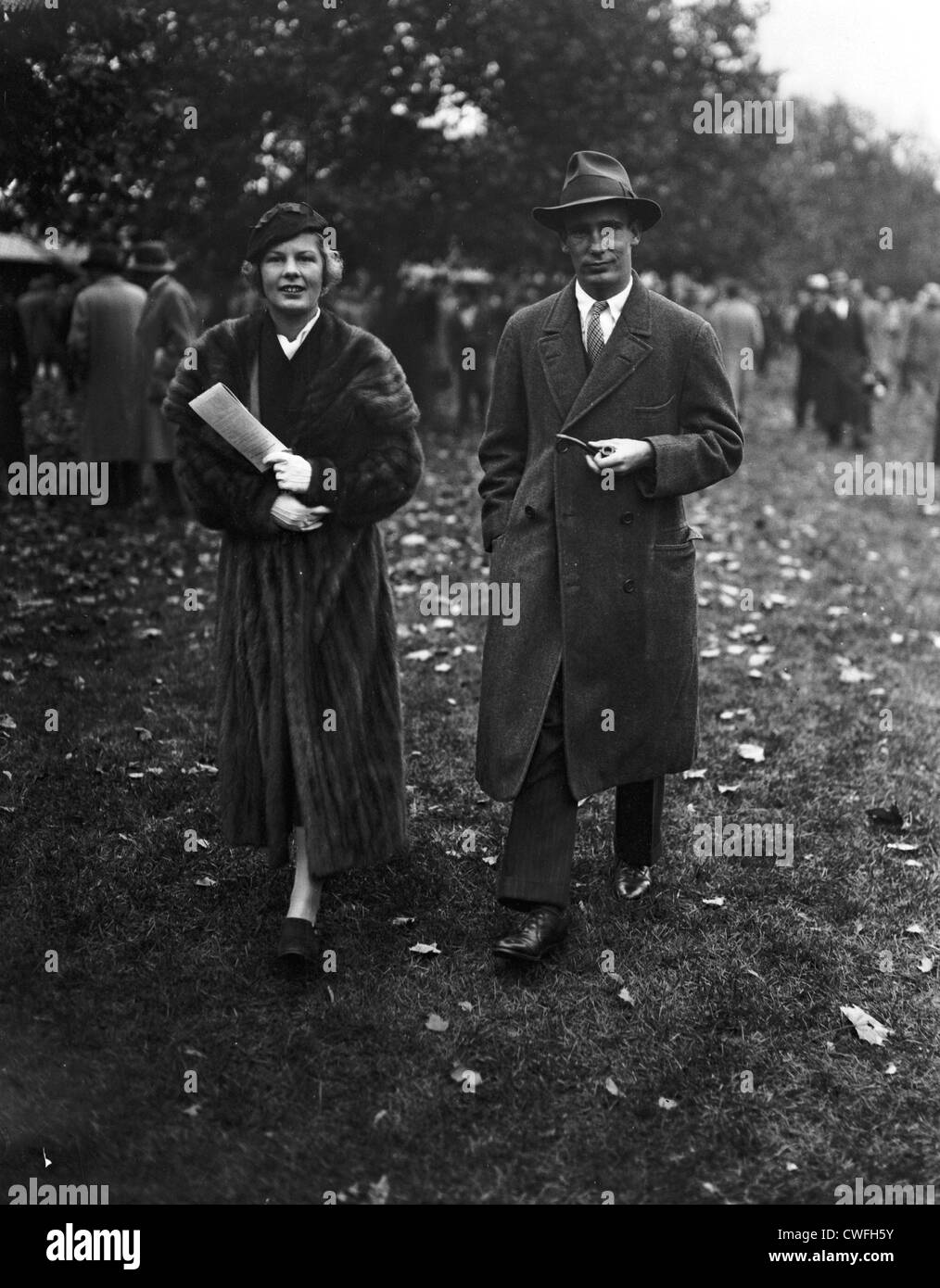 Mr and Mrs August Belmont IV,  arriving at Belmont Race Track, New York, ca 1937 Stock Photo