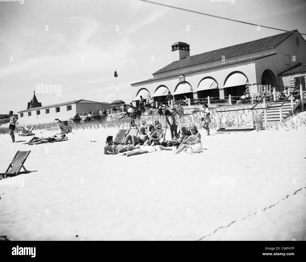 View of Southampton Bathing Corporation with sunbathers, Southampton, New York, 1953 Stock Photo