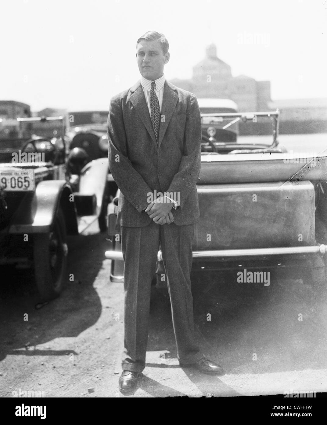 John Jacob Astor VI standing by a car in Newport, Rhode Island, ca 1935 Stock Photo