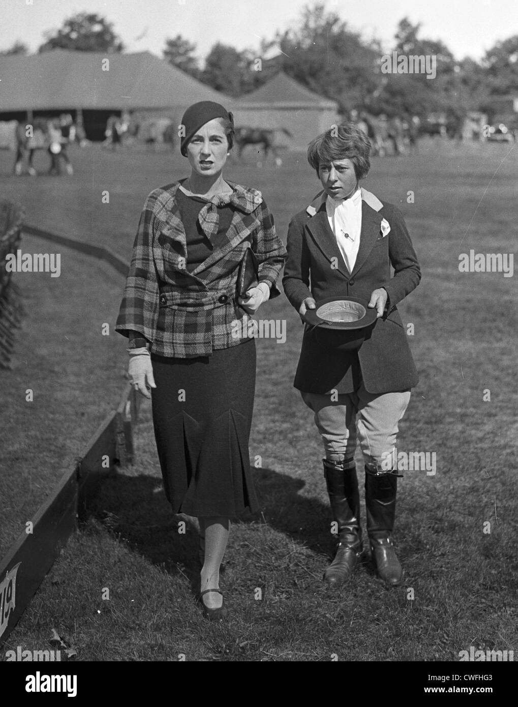 Mrs John V Bouvier III & Miss Jean D Olcott (daughter of Mrs Dudley Olcott) at the Piping Rock Horse Show, Long Island, NY, 1934 Stock Photo
