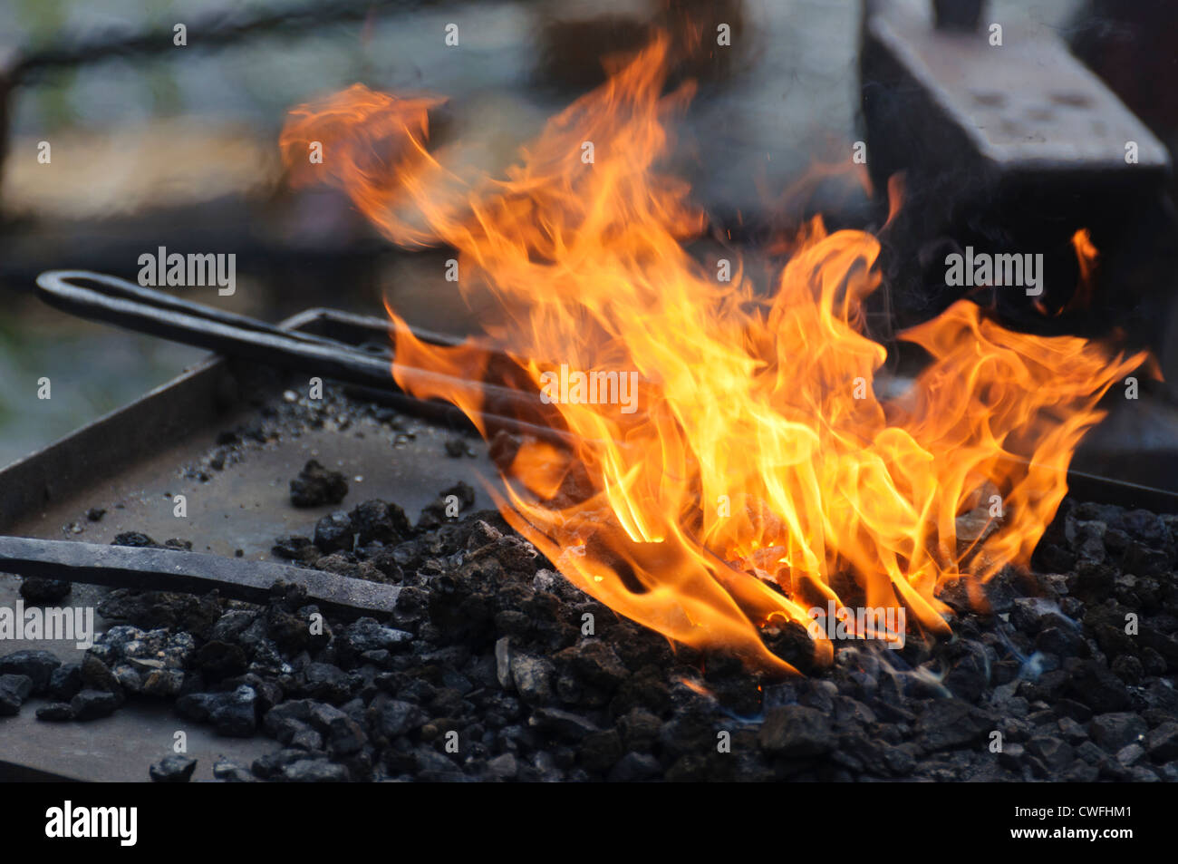 Blacksmith forge and tools in charcoal fire, Bad Wimpfen Zunftmarkt ...