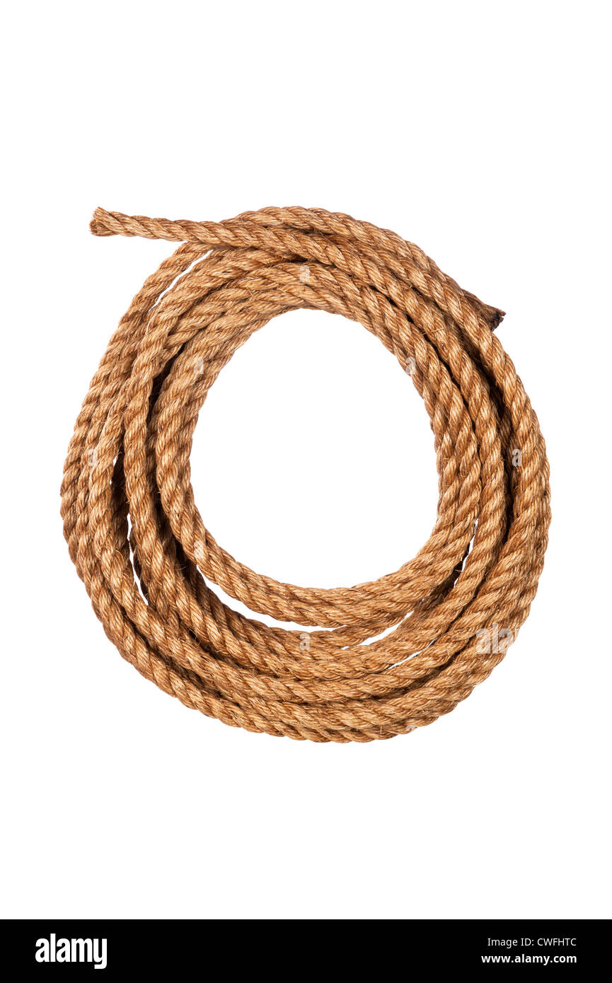 Hemp three strand rope coiled in a circular pattern isolated against a white background. Stock Photo