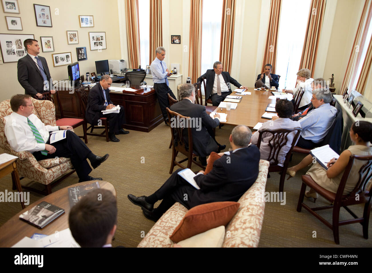 President Barack Obama meets with senior advisors in Chief of Staff Rahm Emanuel's West Wing office at the White House, June 15, Stock Photo