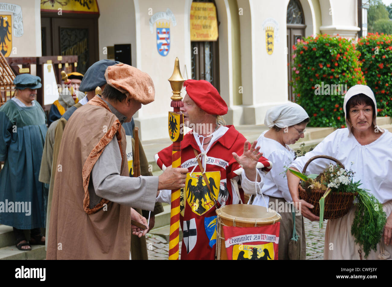 People, actors, in medieval costumes, at a mediaeval market (Zunftmarkt