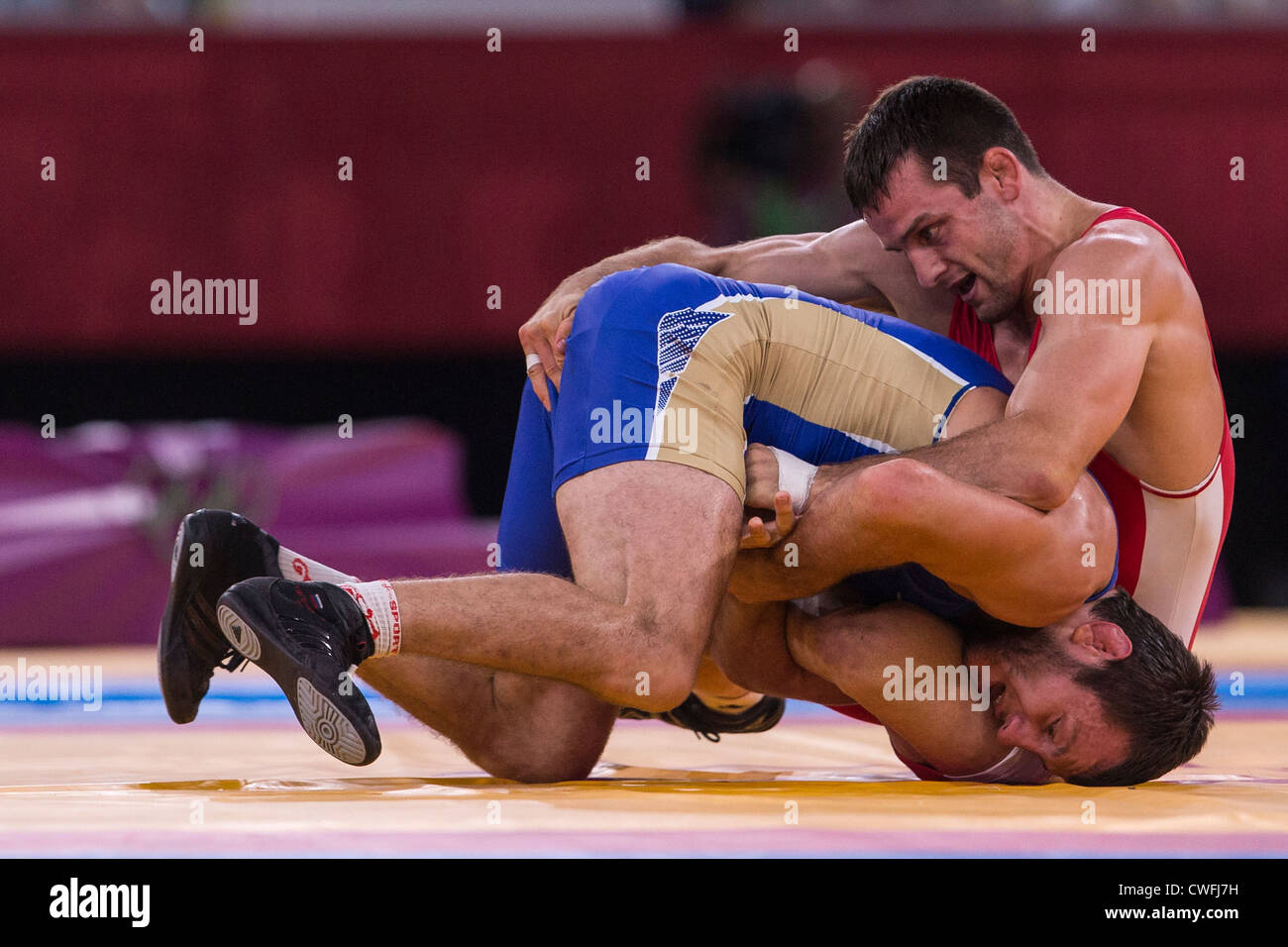 Denis Tsargush (RUS) -B- vs Matthew Judah Gentry (CAN) in Men's 74kg Freestyle Wrestling at the Olympic Stock Photo