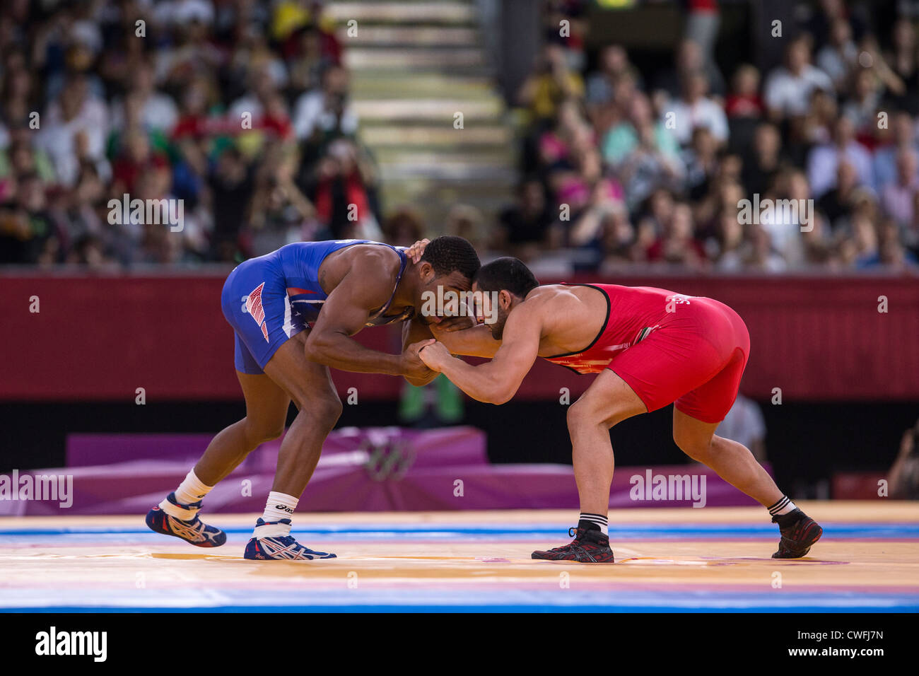 Jordan Ernest Burroughs (USA) -B- vs Sadegh Saeed Goudarzi (IRI) in Men's 74kg Freestyle Wrestling at the Olympic Stock Photo
