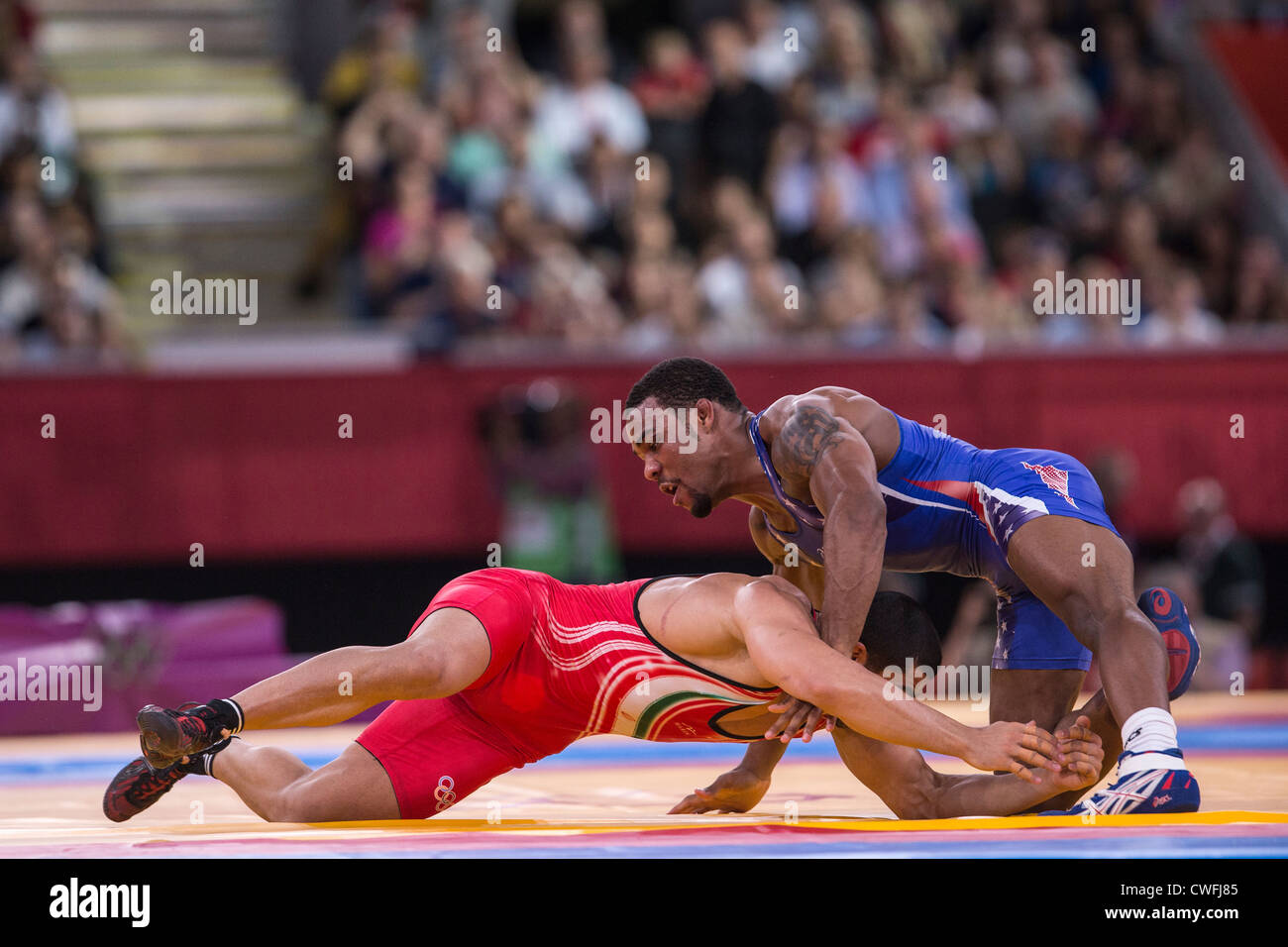 Jordan Ernest Burroughs (USA) -B- vs Sadegh Saeed Goudarzi (IRI) in Men's 74kg Freestyle Wrestling at the Olympic Stock Photo