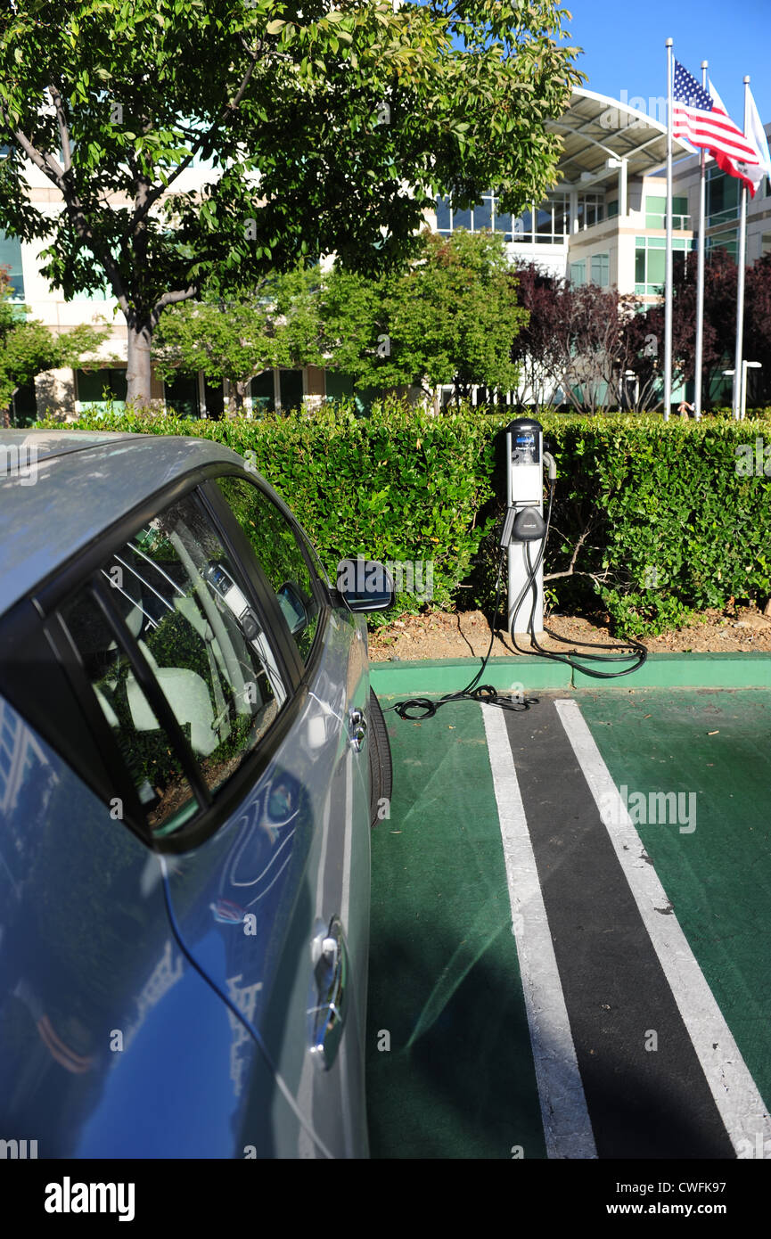 Electric Vehicle charging station at an office park in Cupertino, California Nissan Leaf Auto EV refueling Stock Photo