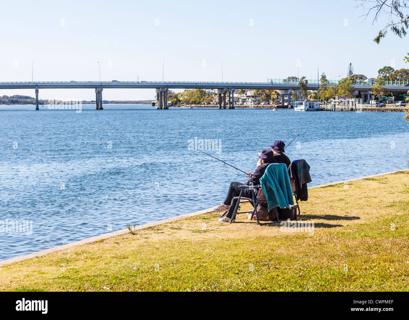 Senior couple fishing at Maroochy River, Sunshine Coast Queensland, Australia, near the Sunshine